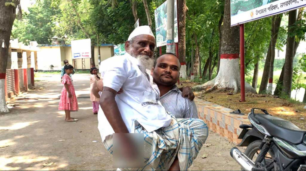 জীবিত থেকেও জাতীয় পরিচয়পত্রে মৃত প্রতিবন্ধী রোস্তম আলী